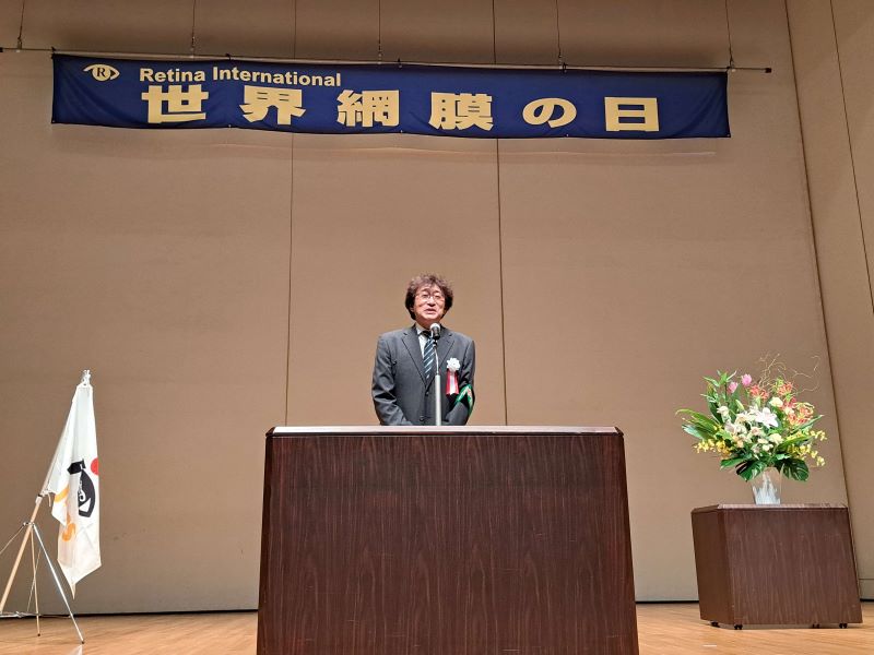 開会式で挨拶するJRPS神奈川今村会長